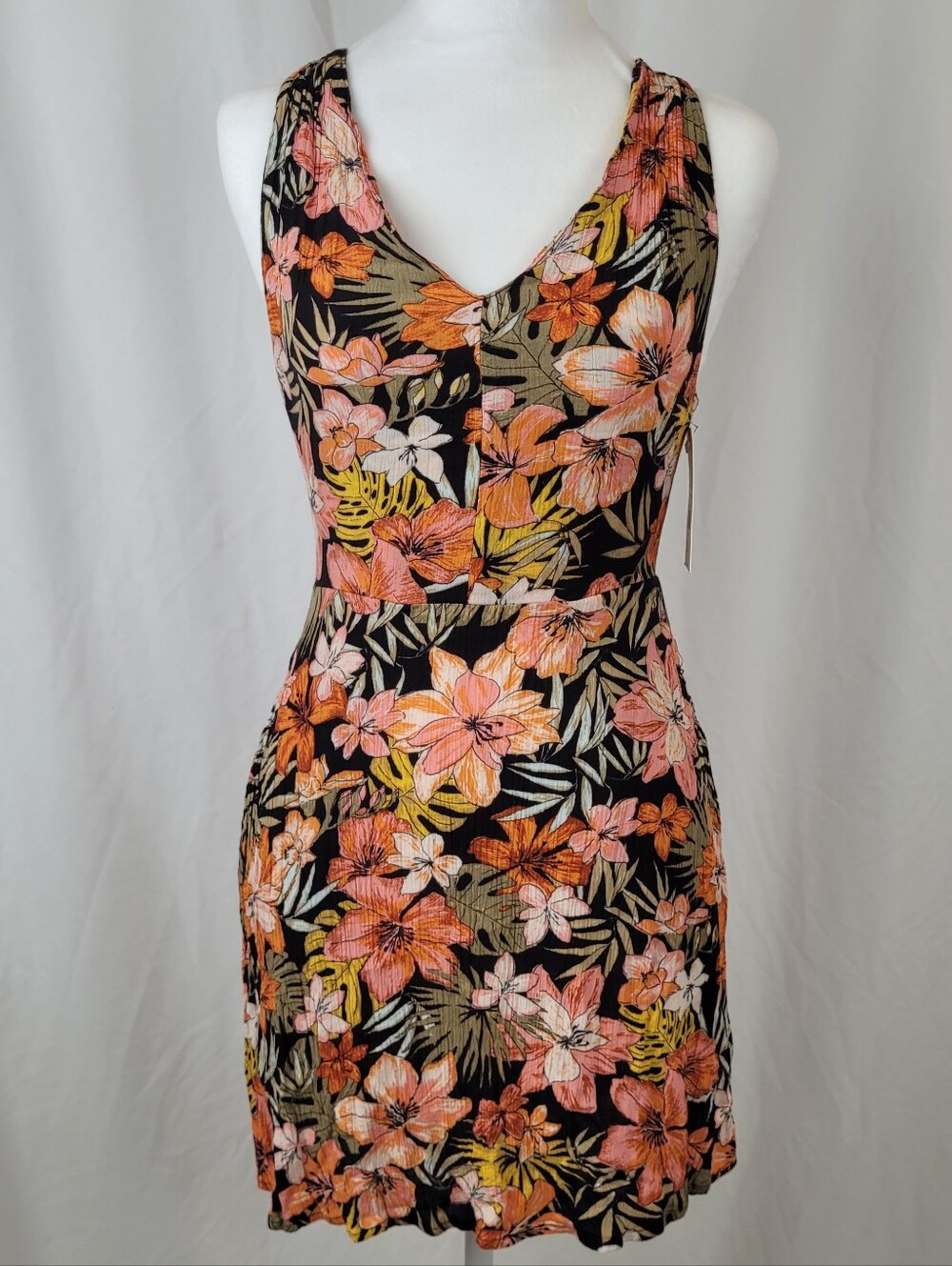 NWT Billabong Black Mini Dress with Coral and Yellow Floral Print. With Pockets